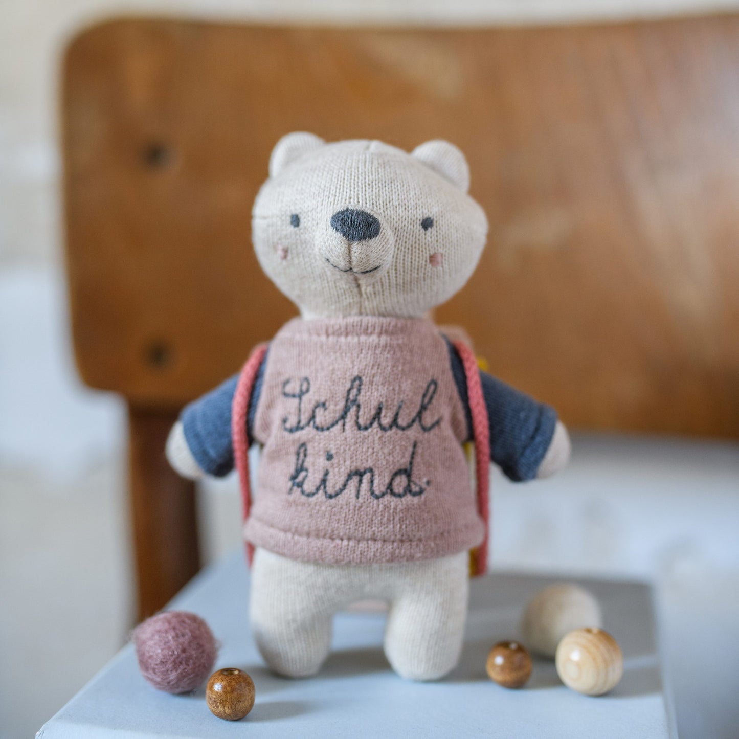 Bär „Schulkind“ mit Schulranzen und Shirt in rosa/blau Kuscheltier
