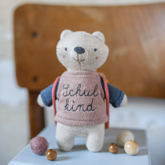 Bär „Schulkind“ mit Schulranzen und Shirt in rosa/blau Kuscheltier