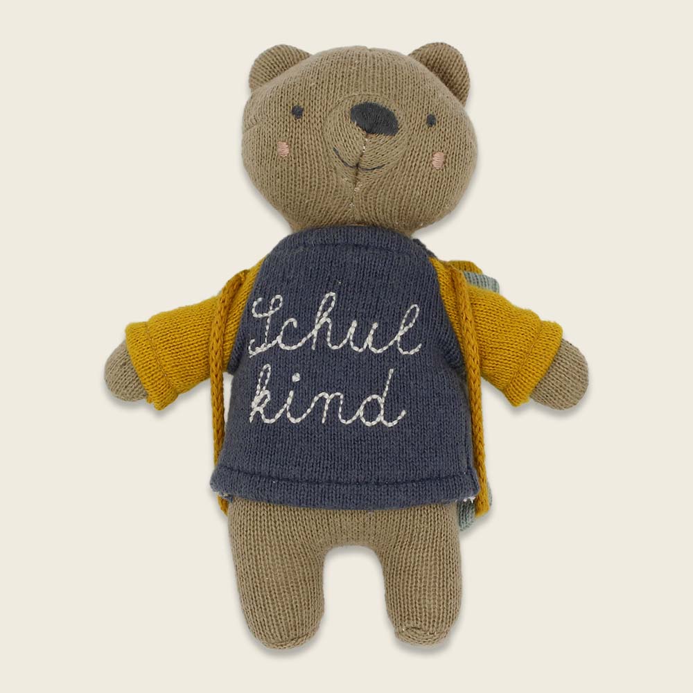 Bär „Schulkind“ mit Schulranzen und Shirt in blau/gelb Kuscheltier