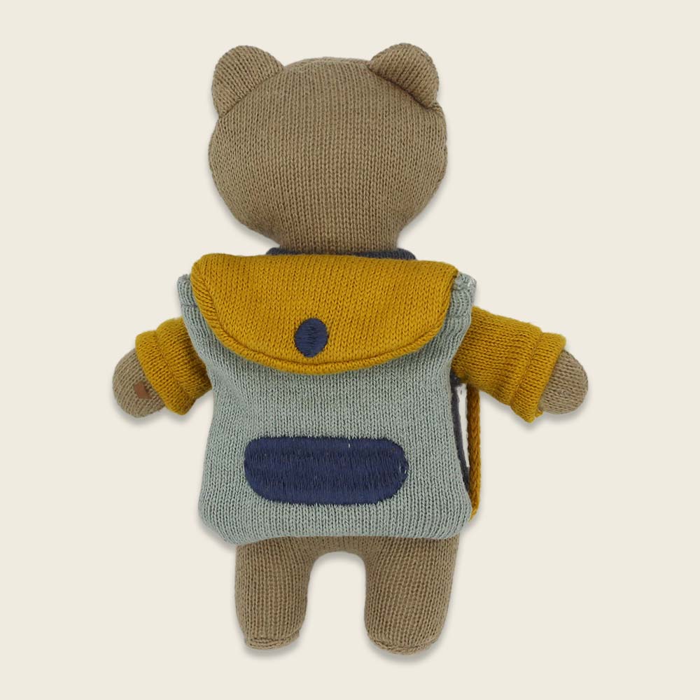 Bär „Schulkind“ mit Schulranzen und Shirt in blau/gelb Kuscheltier