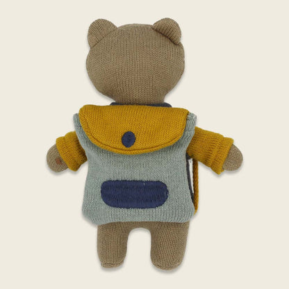 Bär „Schulkind“ mit Schulranzen und Shirt in blau/gelb Kuscheltier